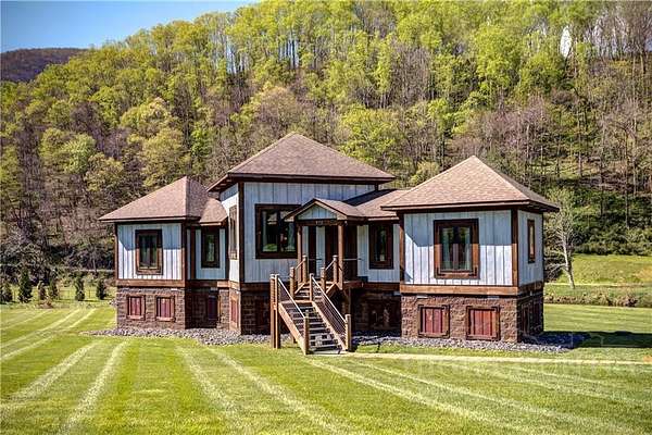2.22 Acres of Land with Home for Sale in Lansing, North Carolina