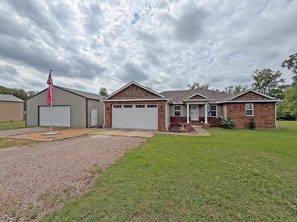 1.65 Acres of Land with Home for Sale in Adamsville, Tennessee