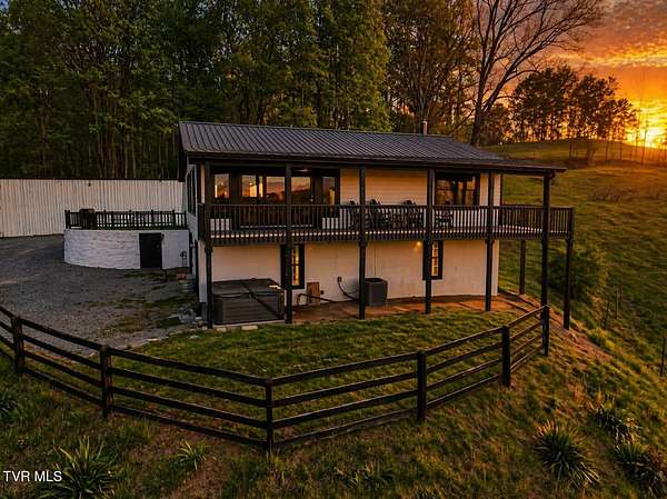 10.6 Acres of Land with Home for Sale in Roan Mountain, Tennessee