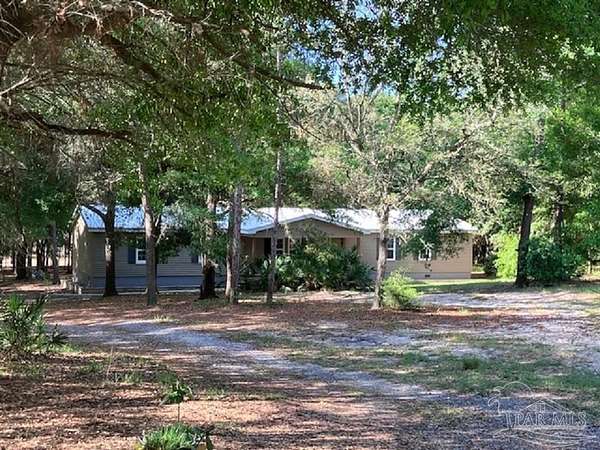 5.74 Acres of Land with Home for Sale in Milton, Florida