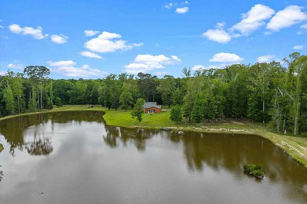 14.2 Acres of Land with Home for Sale in De Berry, Texas