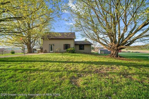 1.5 Acres of Land with Home for Sale in Ithaca, Michigan