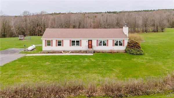 25 Acres of Agricultural Land with Home for Sale in Lacona, New York