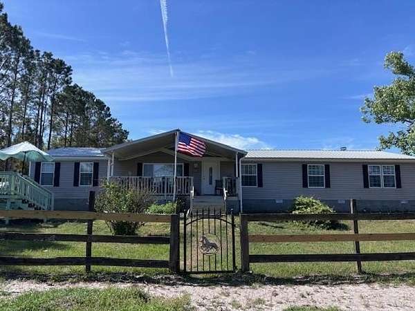 10 Acres of Land with Home for Sale in Chiefland, Florida