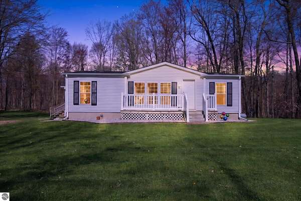 10 Acres of Recreational Land with Home for Sale in Edmore, Michigan