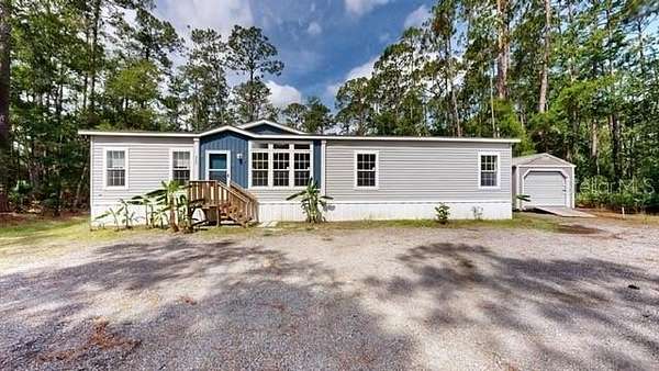 1.67 Acres of Land with Home for Sale in Bunnell, Florida