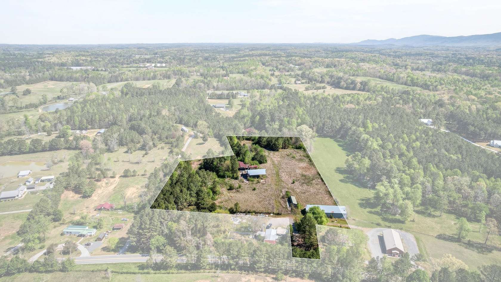 6.7 Acres of Agricultural Land for Sale in Oldfort, Tennessee