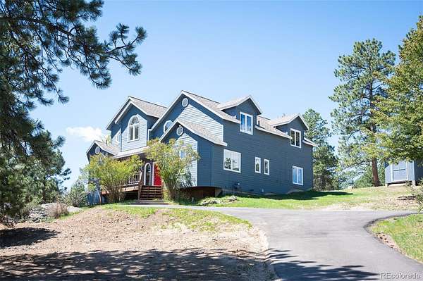 1.55 Acres of Land with Home for Sale in Evergreen, Colorado