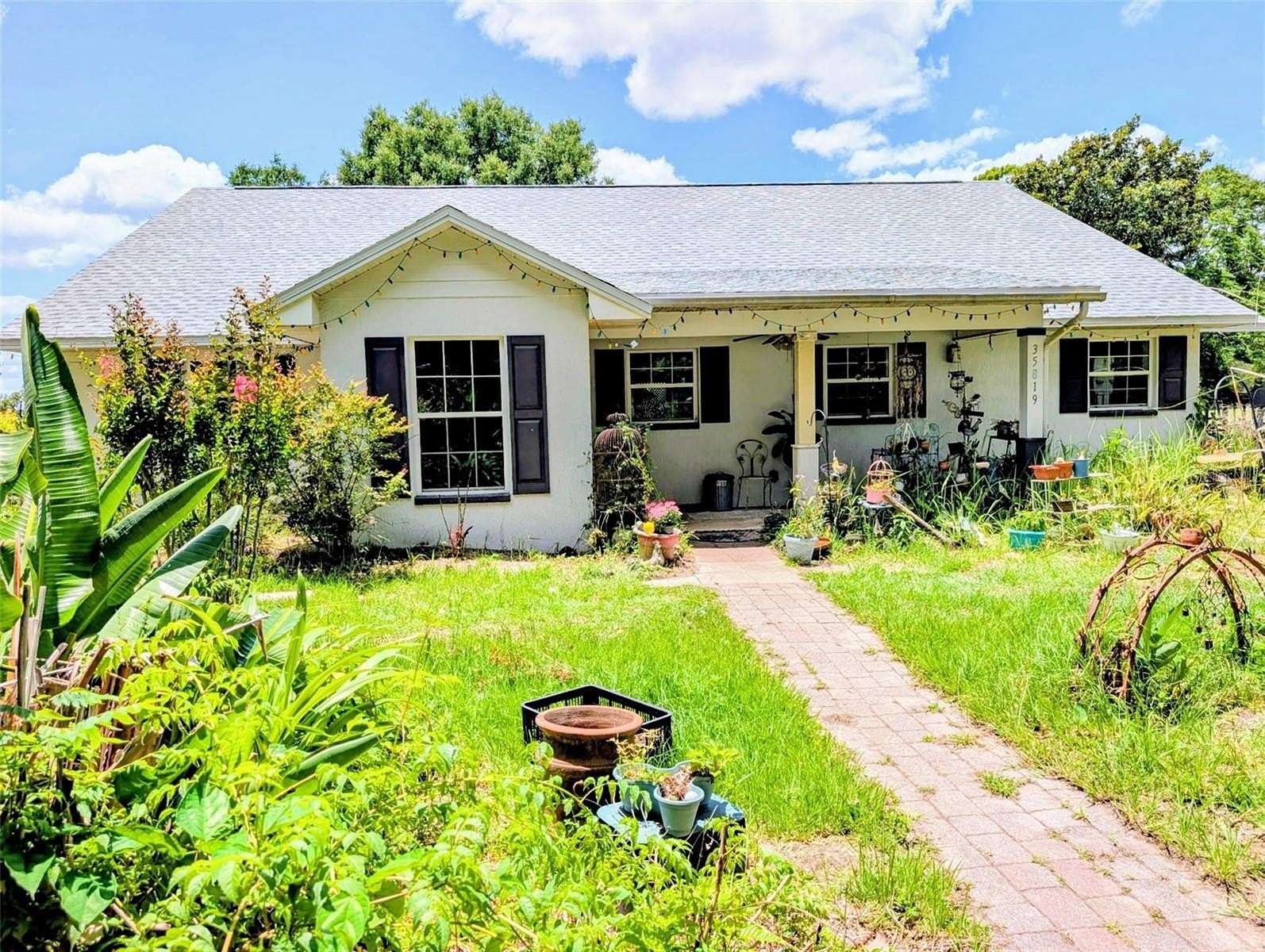 4.78 Acres of Land with Home for Sale in Eustis, Florida