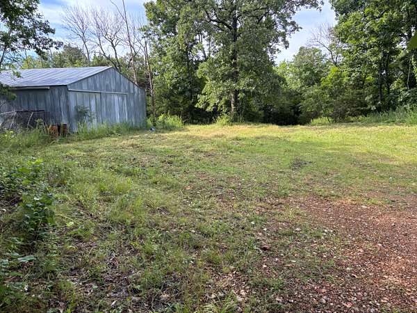 178 Acres of Improved Land for Sale in Weaubleau, Missouri