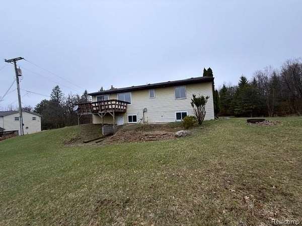 5 Acres of Land with Home for Sale in Ortonville, Michigan