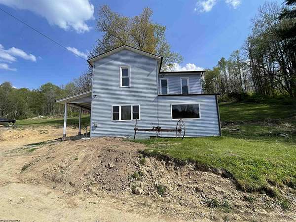 79.4 Acres of Recreational Land with Home for Sale in Belington, West Virginia