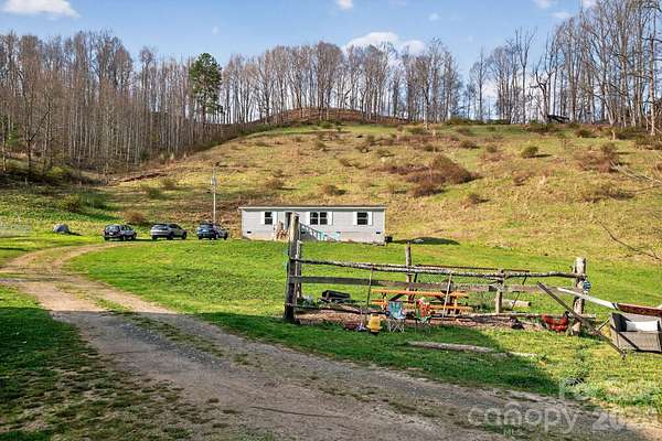 13.4 Acres of Land with Home for Sale in Burnsville, North Carolina