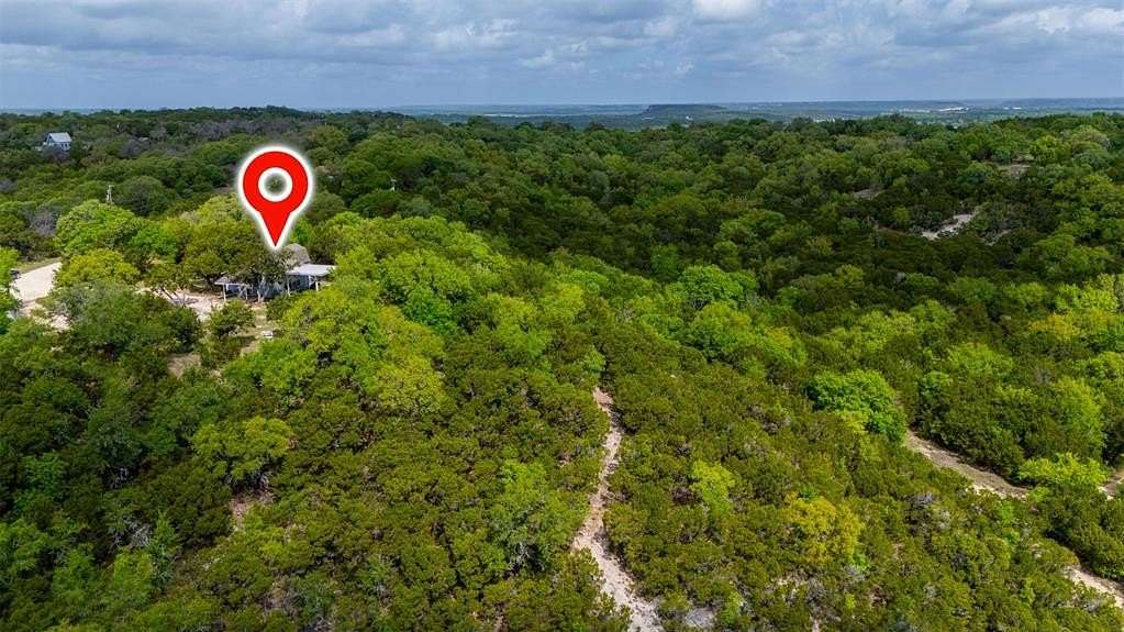 27.5 Acres of Recreational Land with Home for Sale in Kopperl, Texas