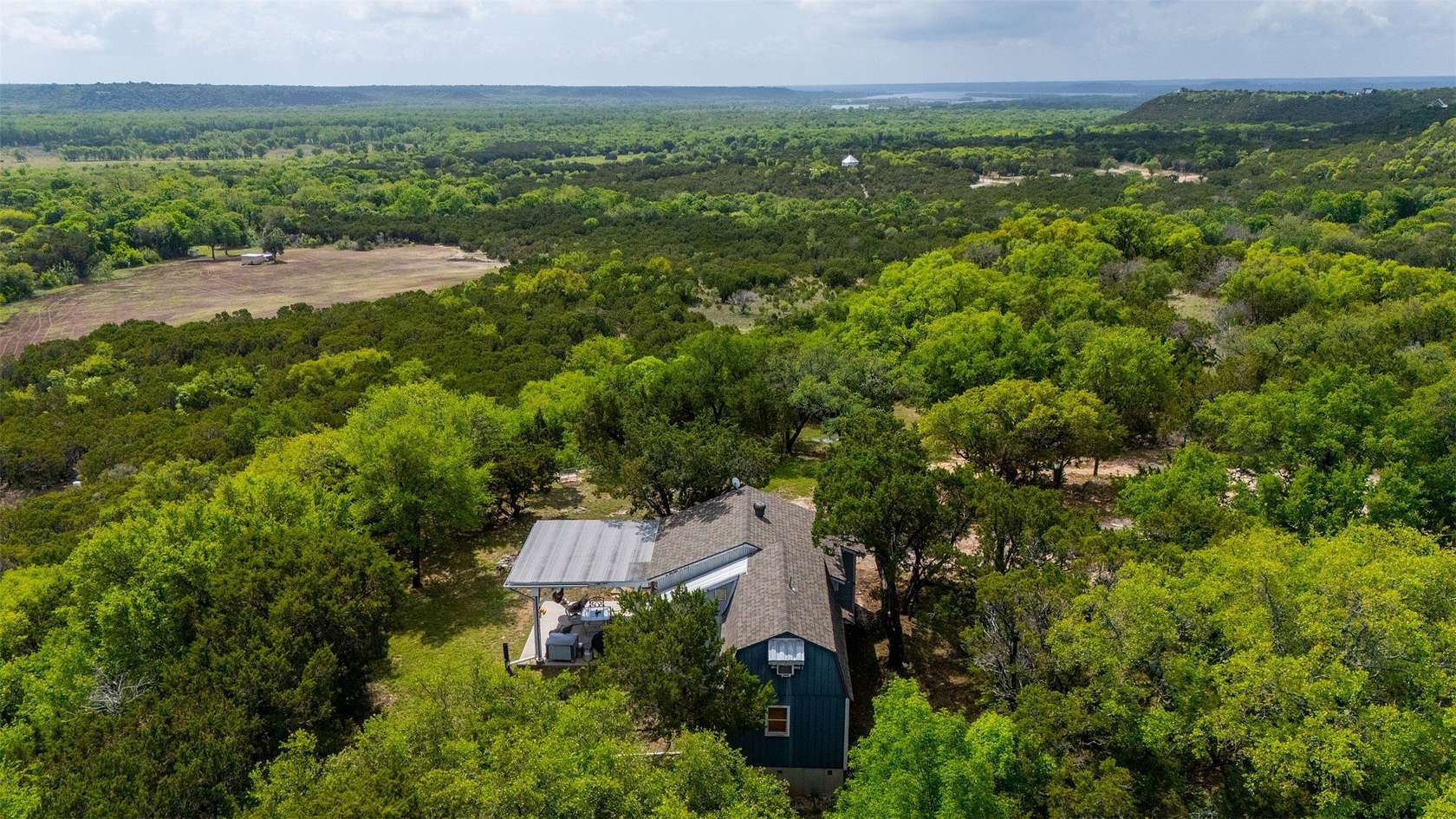 27.5 Acres of Recreational Land with Home for Sale in Kopperl, Texas