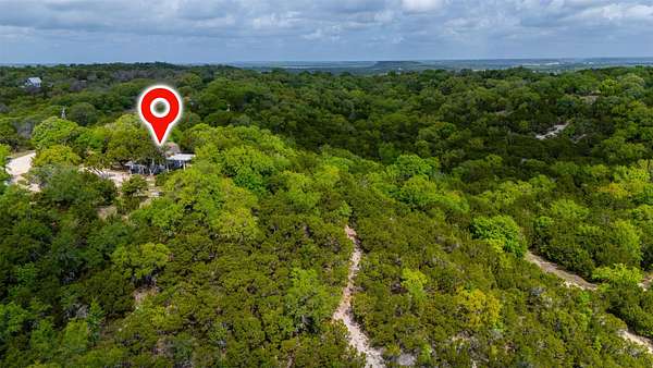 27.5 Acres of Recreational Land with Home for Sale in Kopperl, Texas