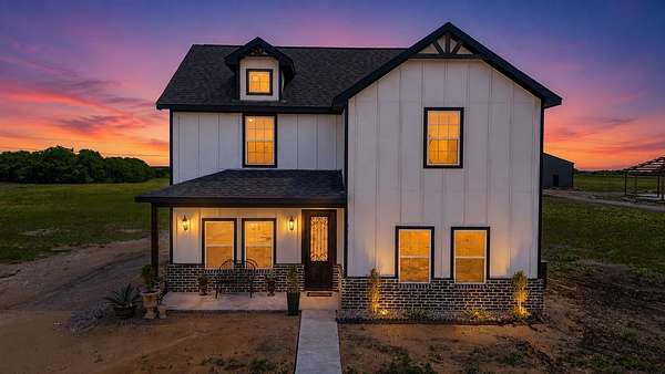 11.1 Acres of Land with Home for Sale in Ennis, Texas