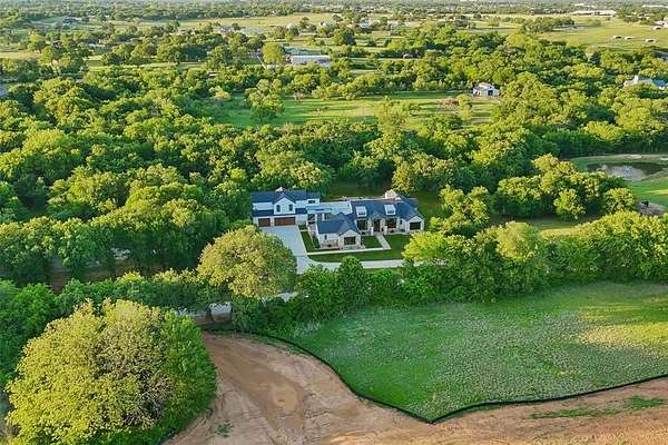 5 Acres of Land with Home for Sale in Aubrey, Texas