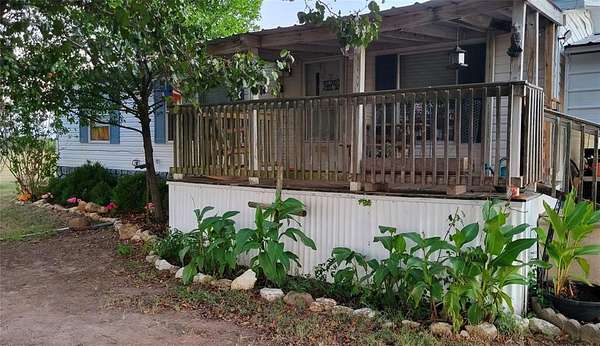 10.3 Acres of Land with Home for Sale in Savoy, Texas