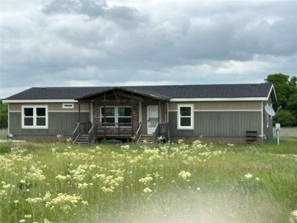 8.26 Acres of Land with Home for Sale in Aquilla, Texas