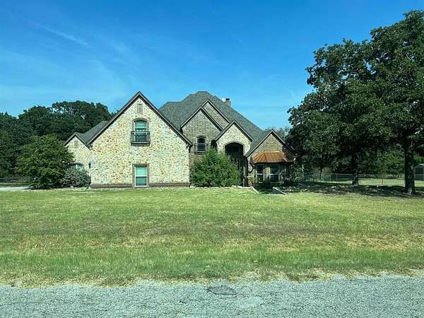 4.14 Acres of Land with Home for Sale in Springtown, Texas