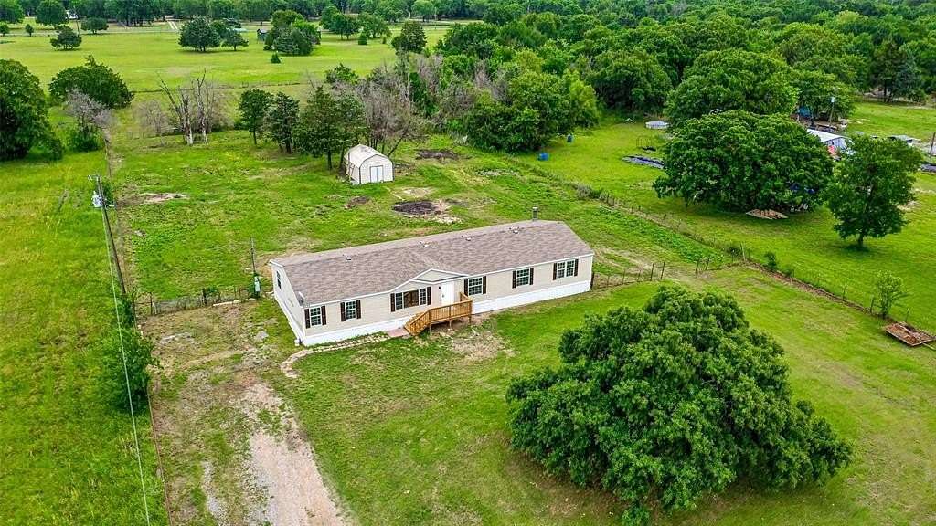 2 Acres of Land with Home for Sale in Quinlan, Texas