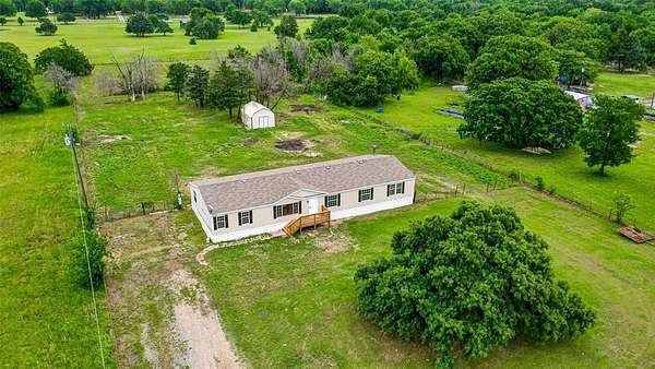2 Acres of Land with Home for Sale in Quinlan, Texas