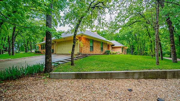 29 Acres of Recreational Land with Home for Sale in Granbury, Texas