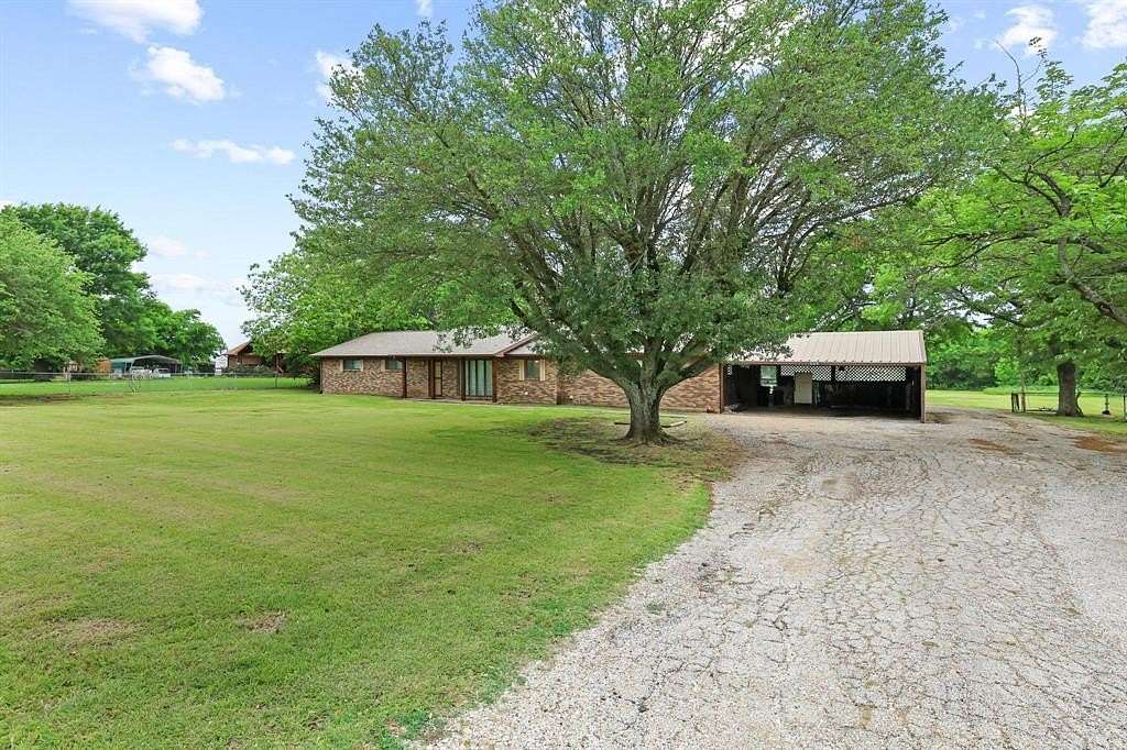 2.5 Acres of Land with Home for Sale in Wolfe City, Texas