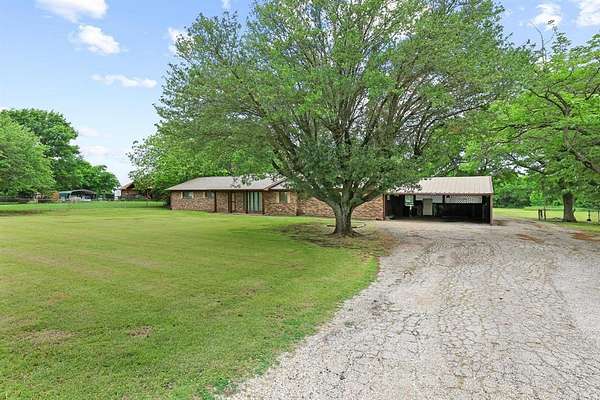 2.5 Acres of Land with Home for Sale in Wolfe City, Texas