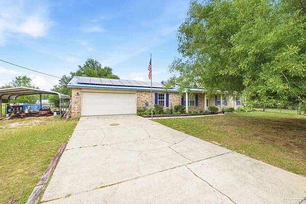 4.58 Acres of Land with Home for Sale in Milton, Florida