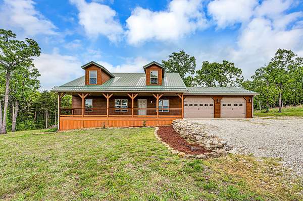 13.2 Acres of Land with Home for Sale in Cedarcreek, Missouri