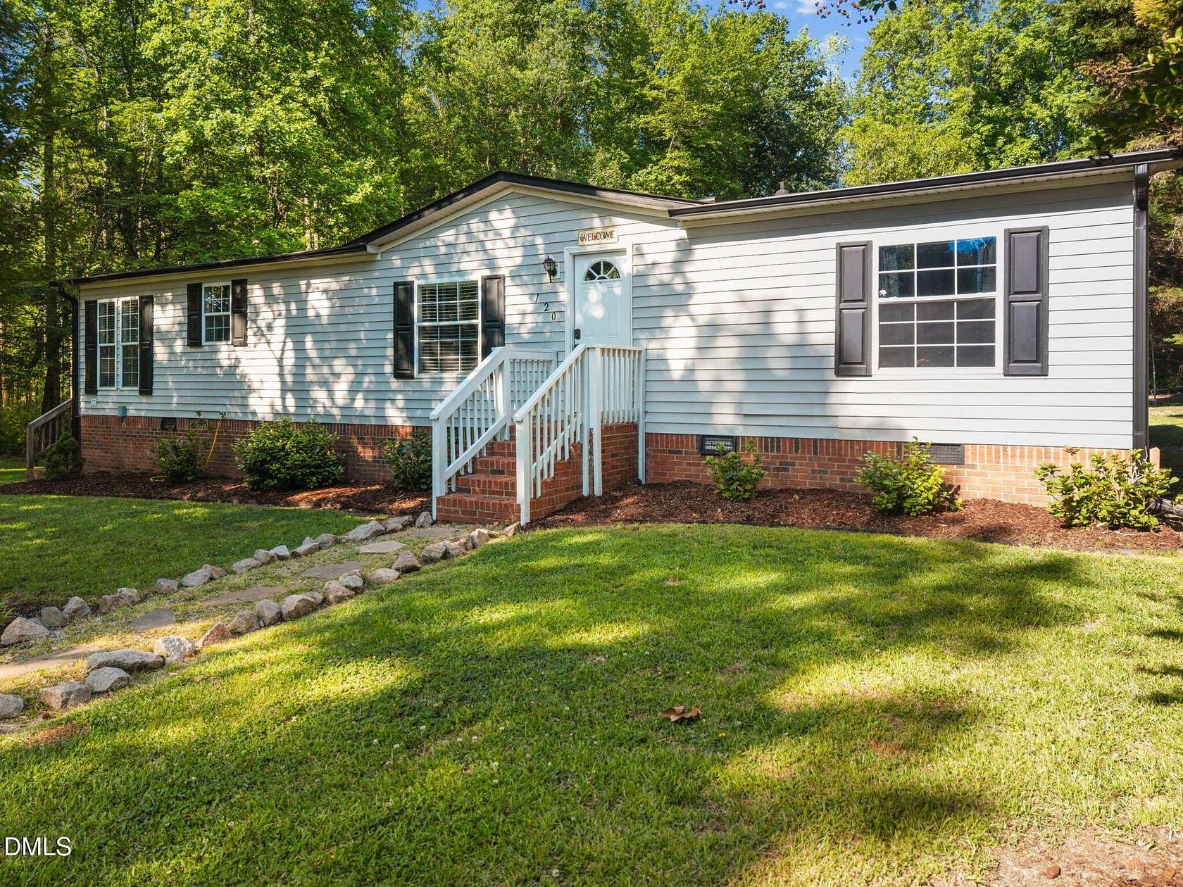 1.5 Acres of Land with Home for Sale in Zebulon, North Carolina