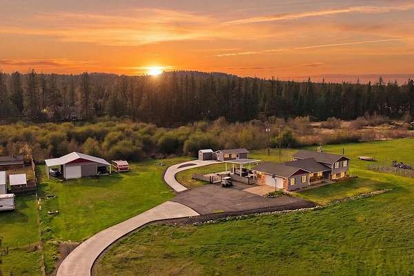 3.3 Acres of Land with Home for Sale in Colbert, Washington