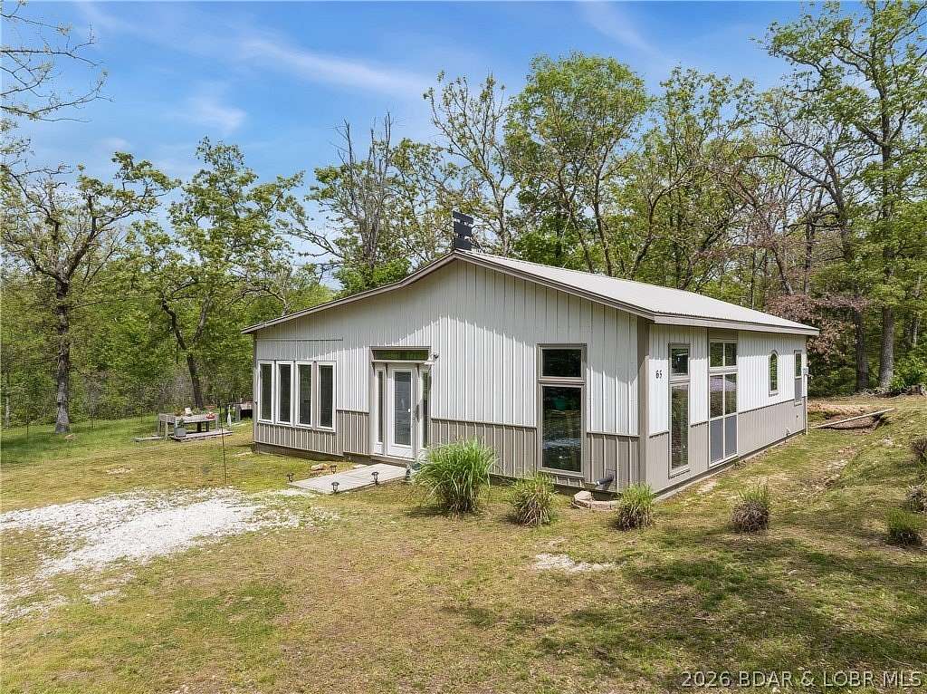 1.87 Acres of Land with Home for Sale in Macks Creek, Missouri