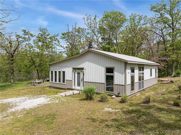 1.87 Acres of Land with Home for Sale in Macks Creek, Missouri