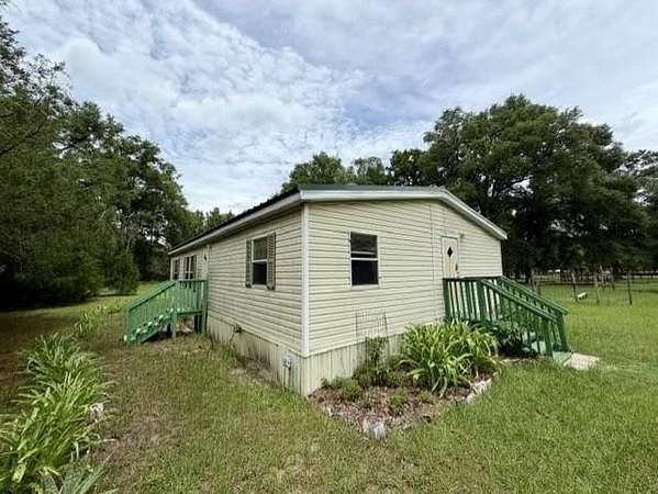 19.5 Acres of Land with Home for Sale in Bell, Florida