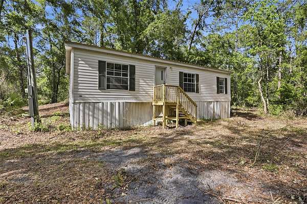 4.47 Acres of Land with Home for Sale in Gainesville, Florida