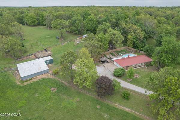 22 Acres of Agricultural Land with Home for Sale in Joplin, Missouri