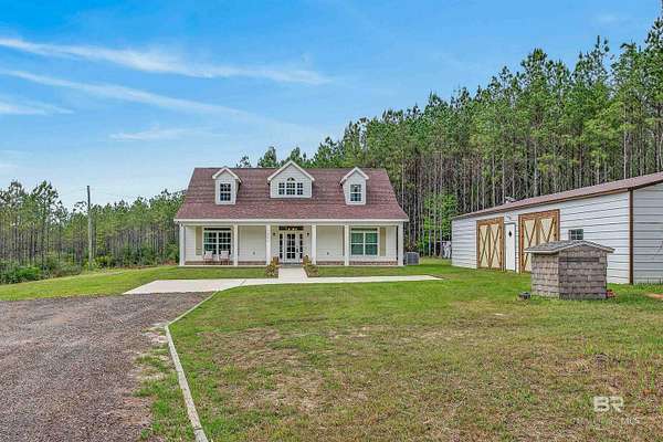 6.9 Acres of Land with Home for Sale in Robertsdale, Alabama