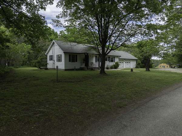 4 Acres of Land with Home for Sale in Lampe, Missouri