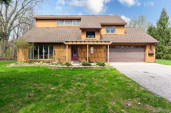 6 Acres of Land with Home for Sale in Oceola Township, Michigan