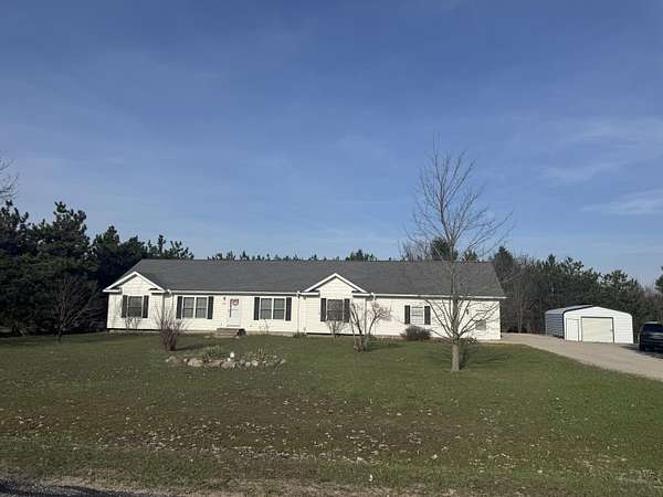 1.63 Acres of Land with Home for Sale in Alanson, Michigan