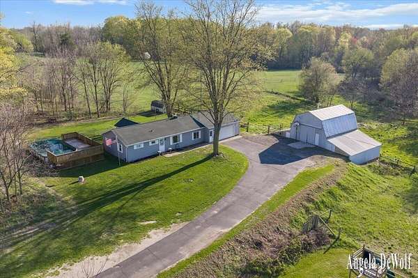 4.82 Acres of Land with Home for Sale in Byron Center, Michigan