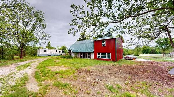 2.9 Acres of Land with Home for Auction in Nevada, Missouri