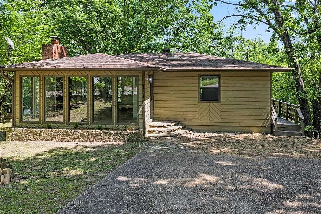 1.8 Acres of Land with Home for Sale in Garfield, Arkansas