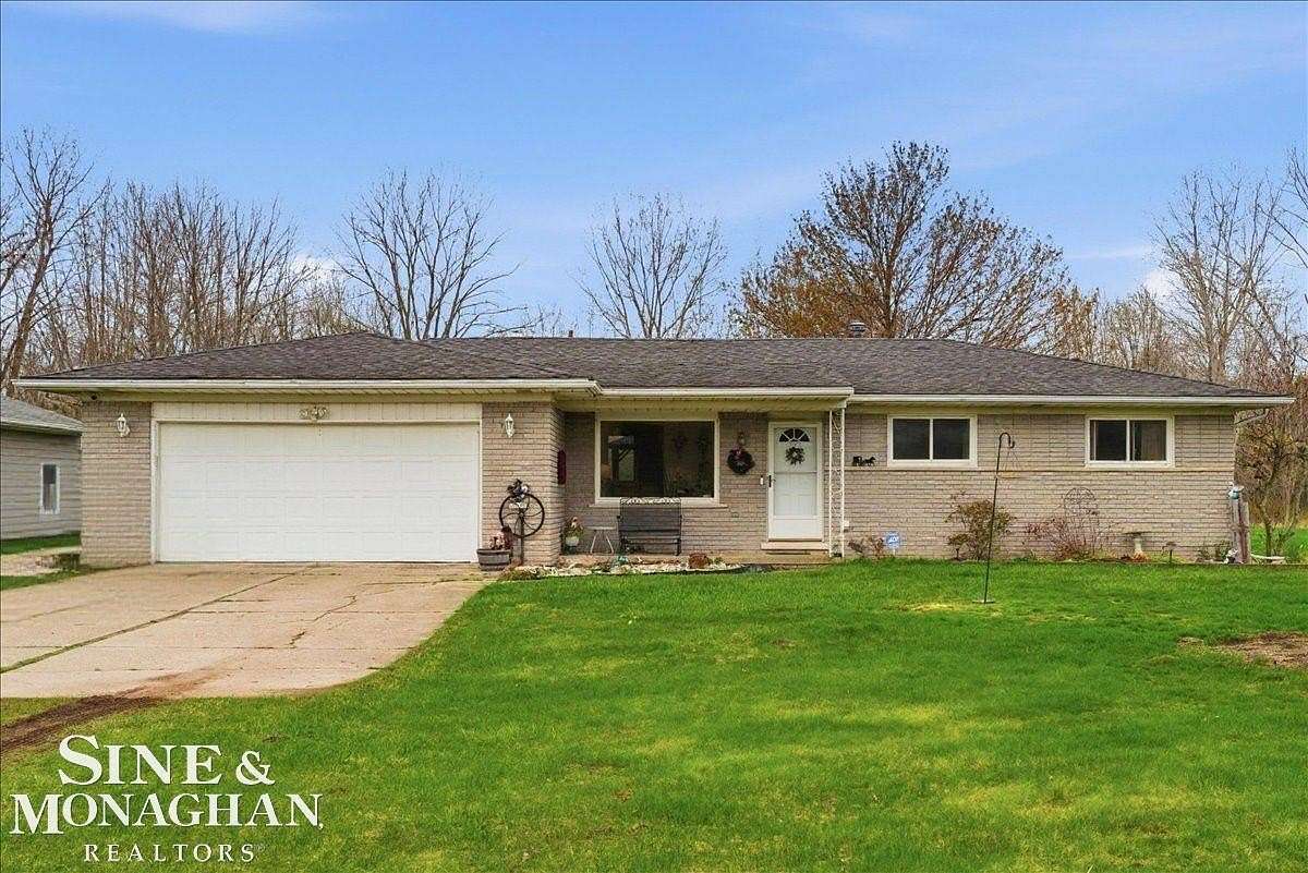 2 Acres of Land with Home for Sale in Casco, Michigan