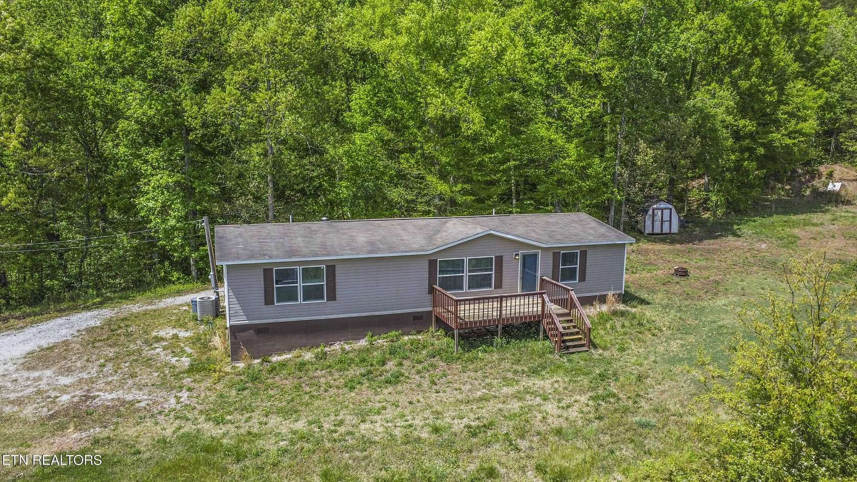 9.4 Acres of Land with Home for Sale in Clinton, Tennessee