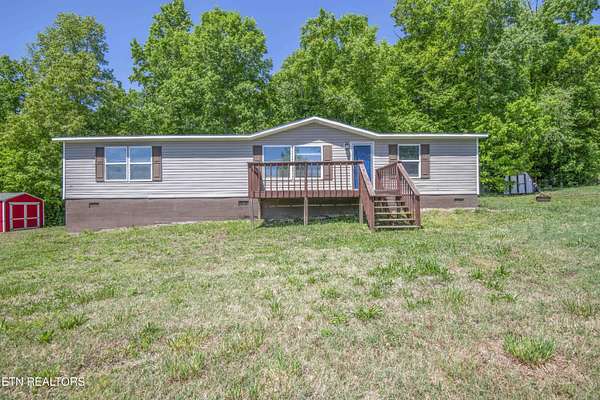 9.4 Acres of Land with Home for Sale in Clinton, Tennessee