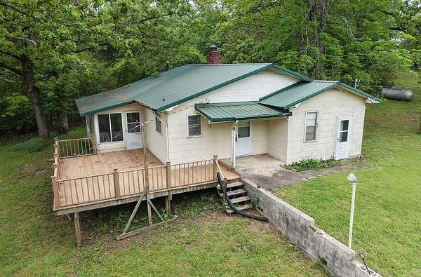 2.2 Acres of Land with Home for Sale in Lampe, Missouri